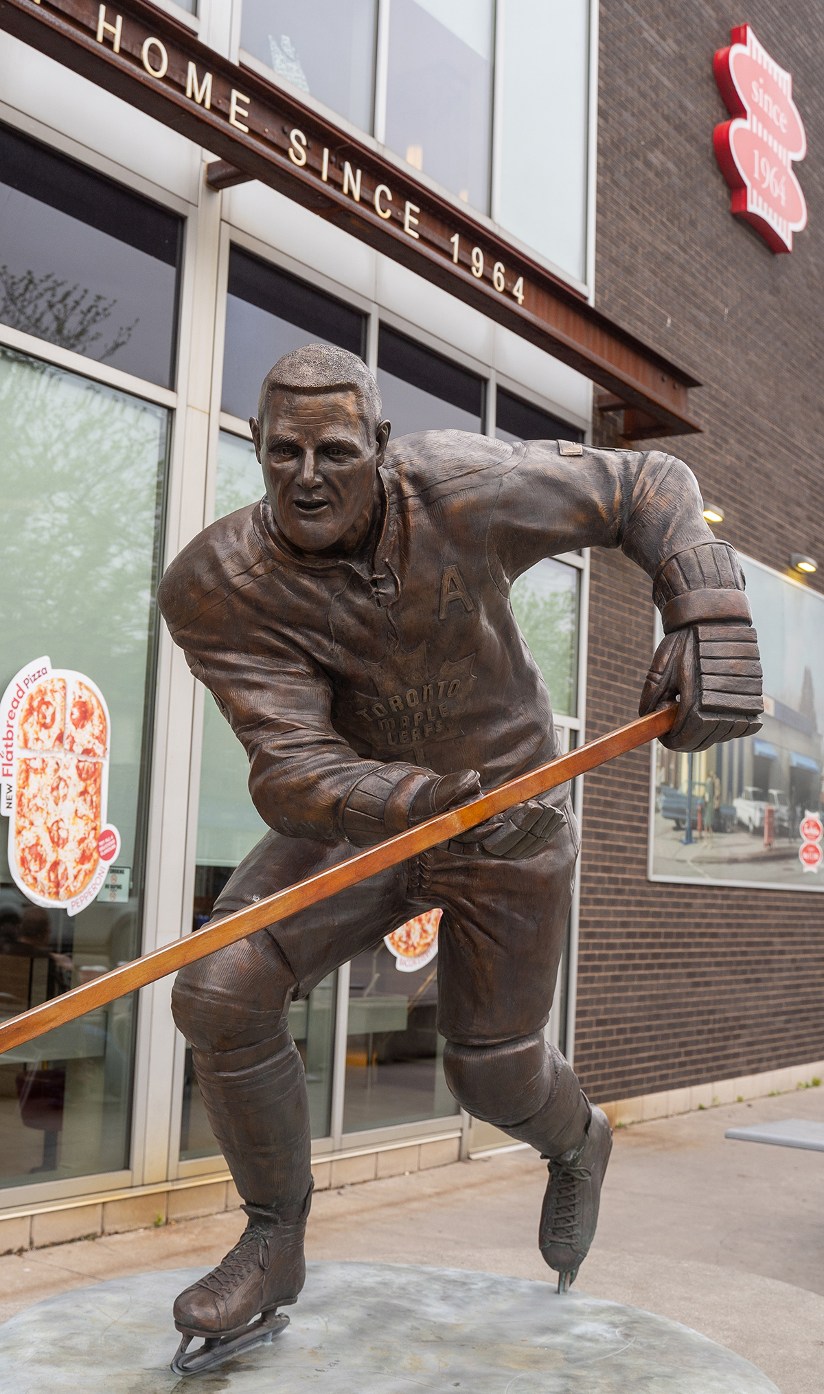 A statue of Tim Horton outside the first-ever Tims restaurant in Hamilton